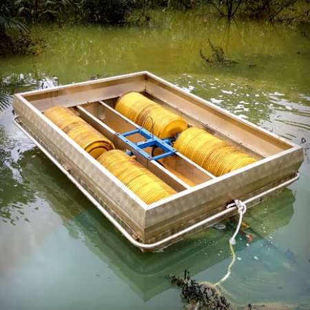 A drum skimmer we set up for a NSW client to clean a river.