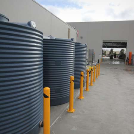 A regulation-compliant Cleanawater rainwater harvesting system outside a commerc