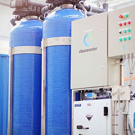 A Cleanawater water treatment and recycling unit at a commercial car wash.