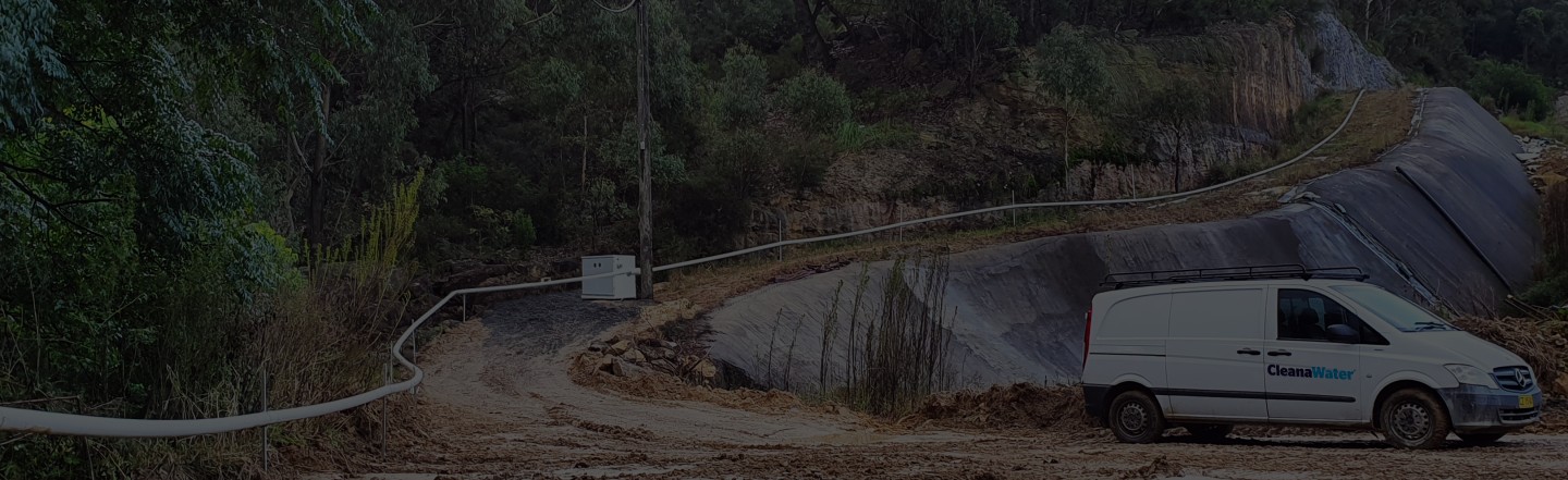 Odour control at a landfill site, showing waste mounds and managed pathways to minimise odorous gas release.