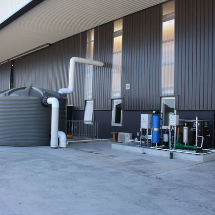 One large rainwater harvesting and treatment tank we set up for a commercial sit