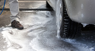 soapy water running into stormdrain